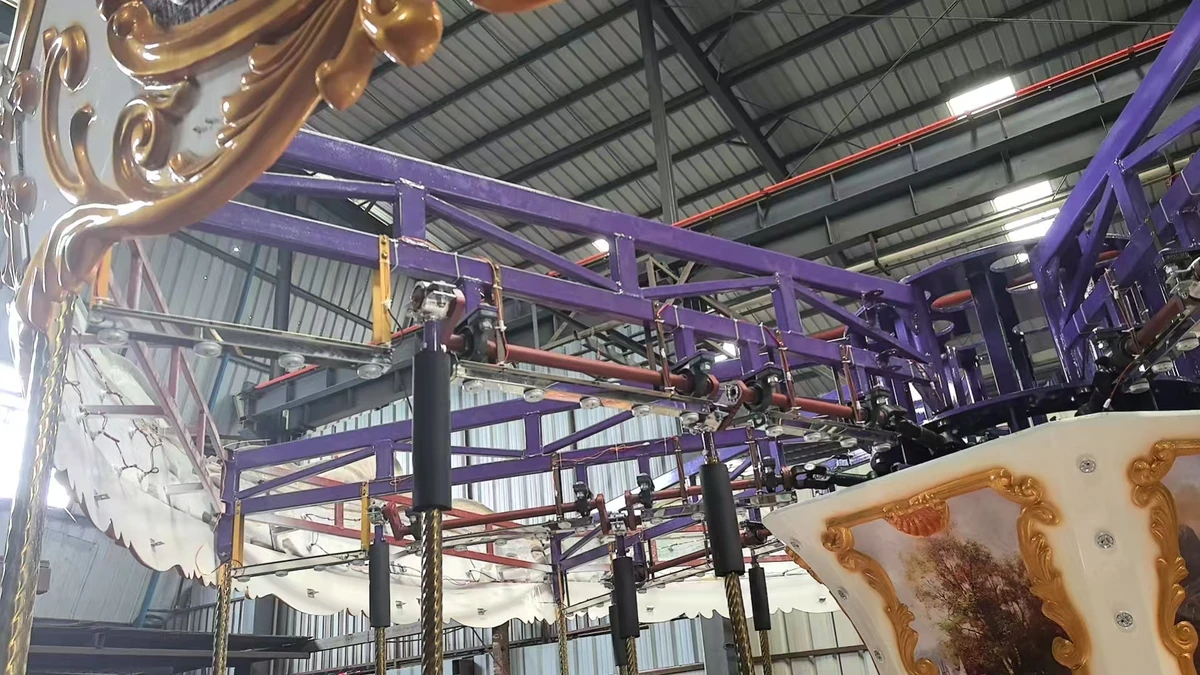 The folding carousel, in build and in service. by JKPARKRIDES