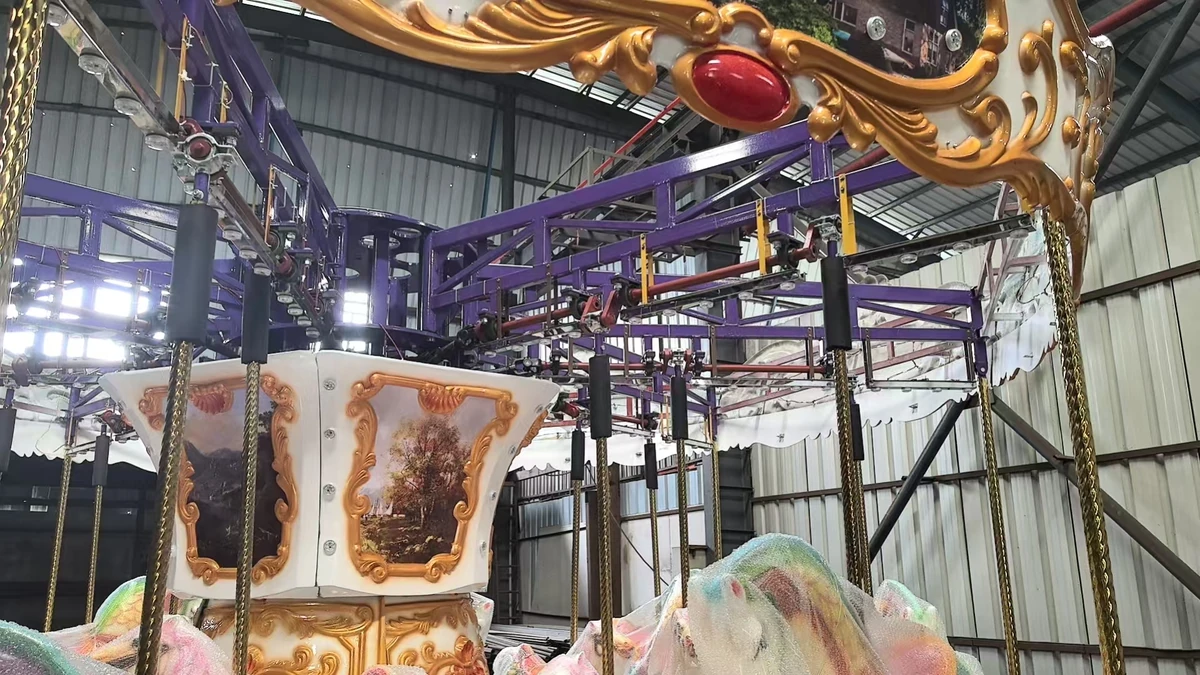 The folding carousel, in build and in service. by JKPARKRIDES